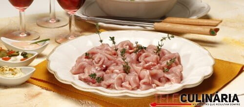 Fondue de carne de porco fatiada